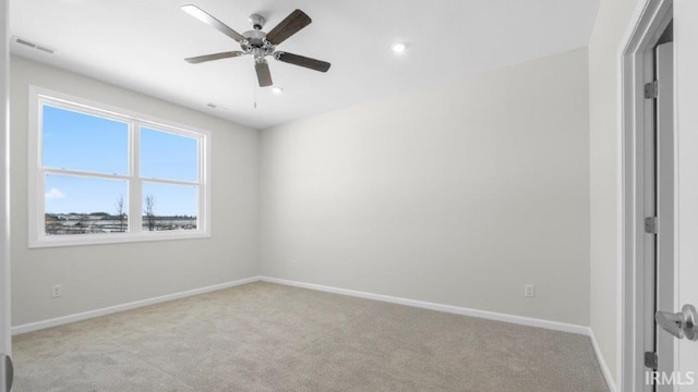 unfurnished bedroom featuring light carpet, visible vents, baseboards, a ceiling fan, and recessed lighting