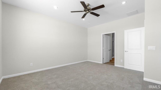unfurnished bedroom with a ceiling fan, recessed lighting, light carpet, and baseboards