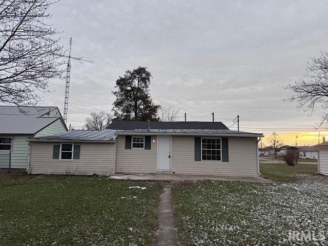 view of front of house with a front lawn