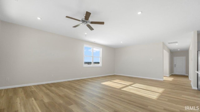 spare room featuring recessed lighting, visible vents, a ceiling fan, baseboards, and light wood-type flooring