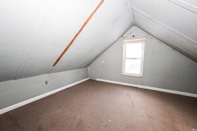 bonus room featuring lofted ceiling