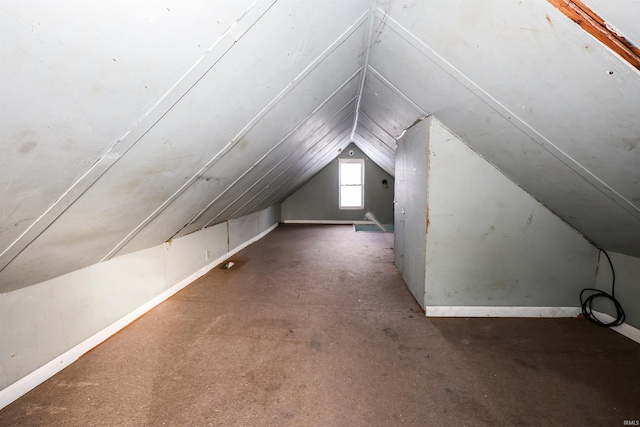 bonus room featuring vaulted ceiling