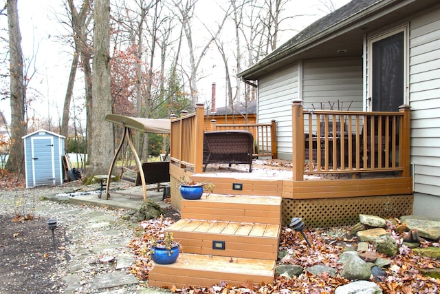 deck featuring a patio area and a storage shed