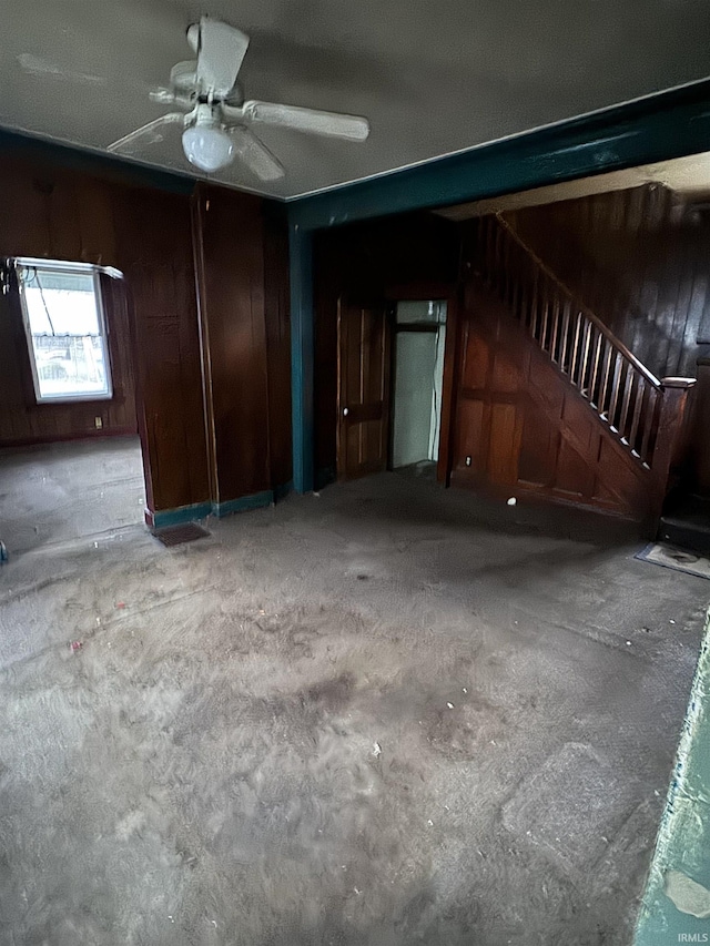 interior space featuring ceiling fan