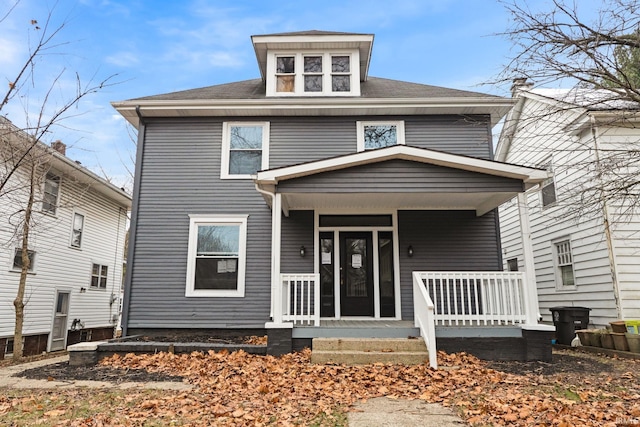 view of property featuring a porch