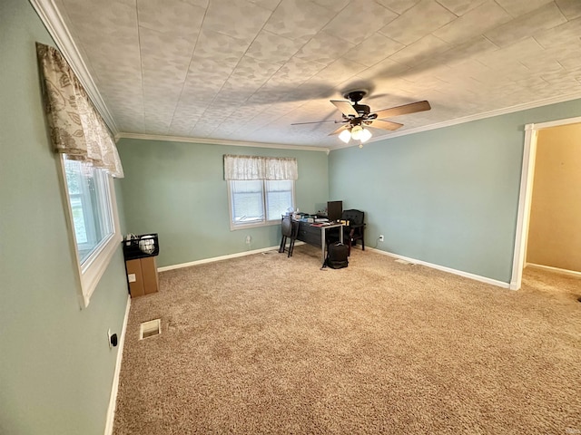 misc room featuring carpet, ceiling fan, and ornamental molding