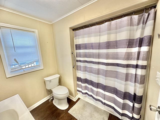 bathroom featuring a shower with curtain, hardwood / wood-style floors, toilet, vanity, and ornamental molding