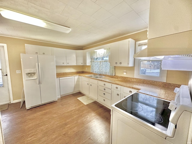 kitchen with sink, white refrigerator with ice dispenser, light hardwood / wood-style floors, white cabinets, and range