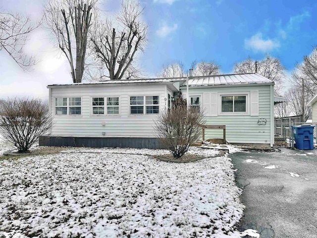 view of snow covered property