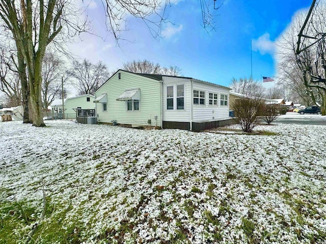 view of snow covered property