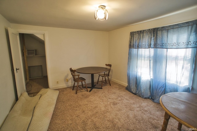 view of carpeted dining space