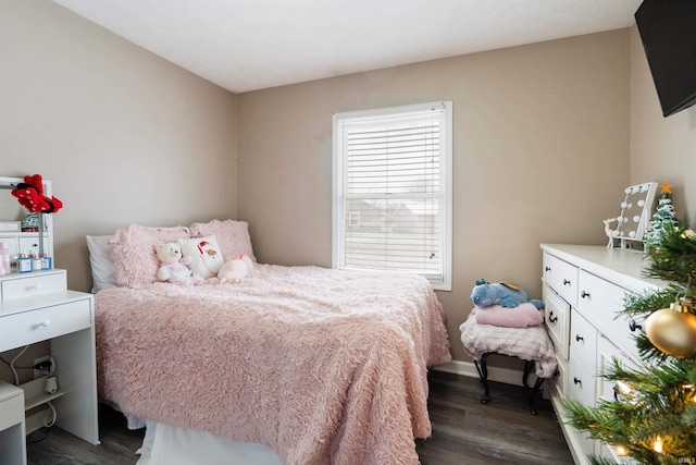 bedroom featuring dark hardwood / wood-style floors