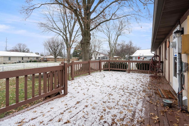 view of snow covered deck