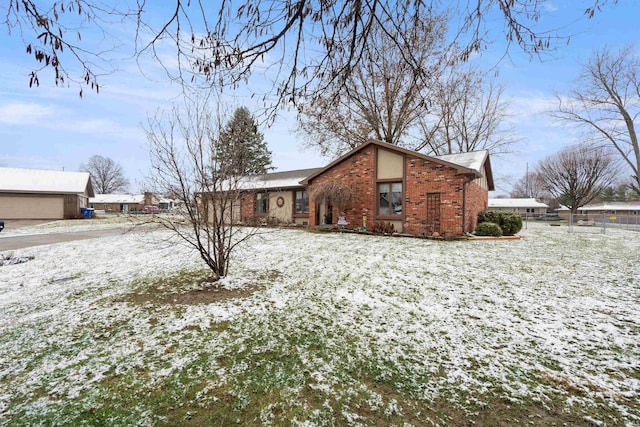 view of snow covered house