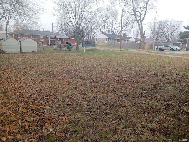 view of yard featuring a trampoline