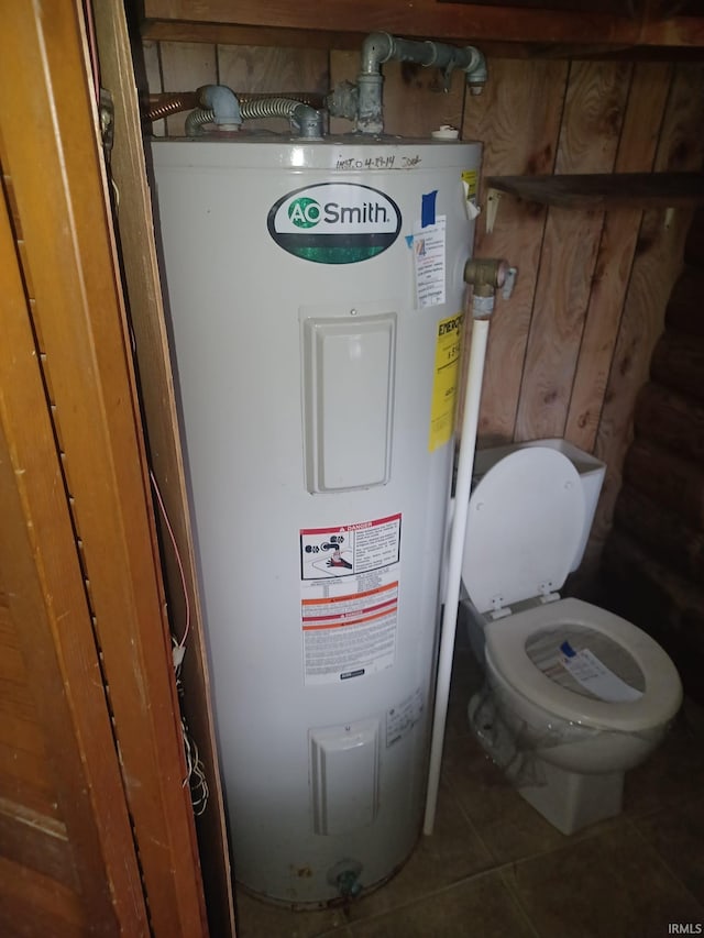 utility room with electric water heater