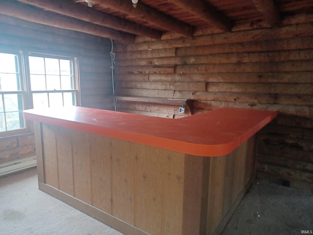 bar with carpet, beamed ceiling, and wooden ceiling