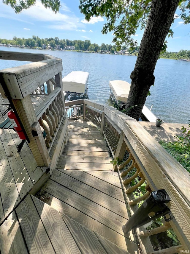 dock area with a water view