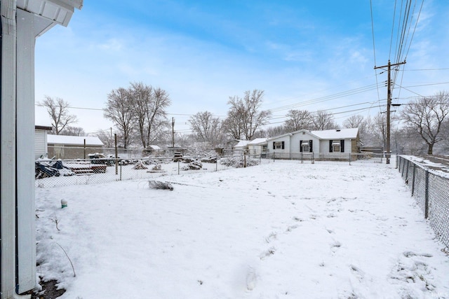 view of yard covered in snow