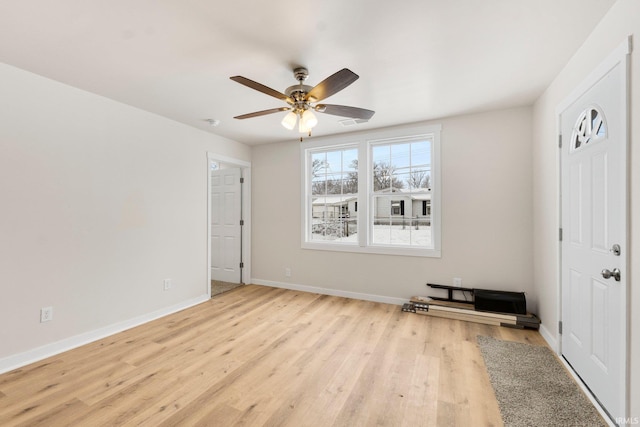 interior space with ceiling fan and light hardwood / wood-style flooring