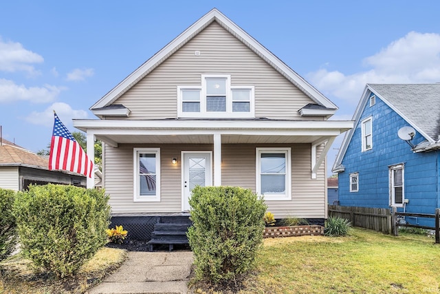 bungalow-style house featuring a front yard