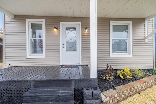 doorway to property with a porch