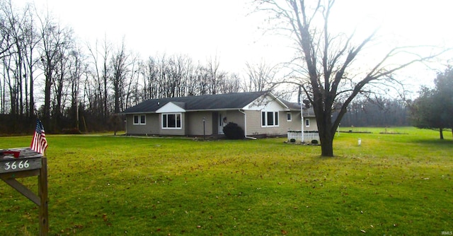 ranch-style house with a front yard