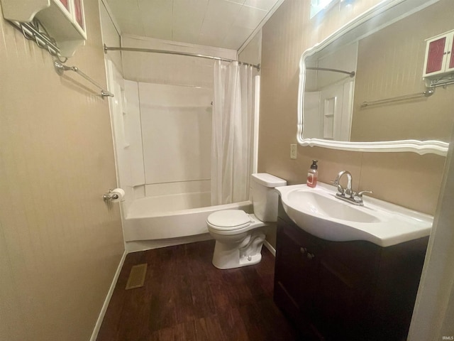 full bathroom featuring shower / bath combo with shower curtain, vanity, wood-type flooring, and toilet