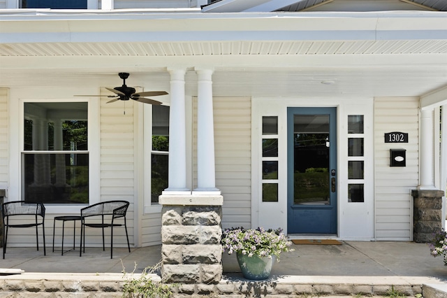 property entrance featuring ceiling fan and covered porch