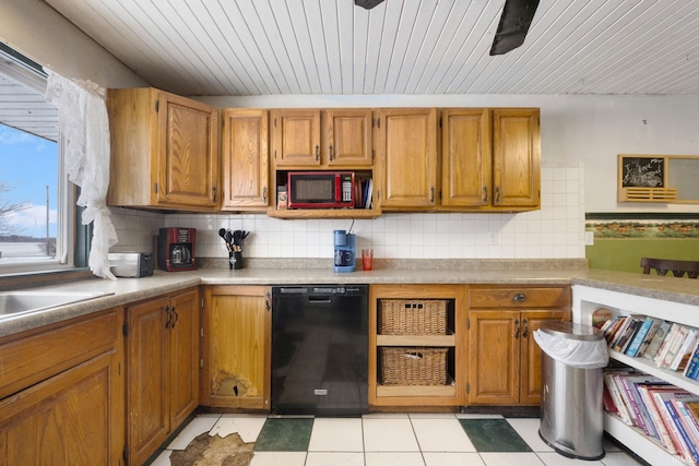 kitchen with black appliances and decorative backsplash