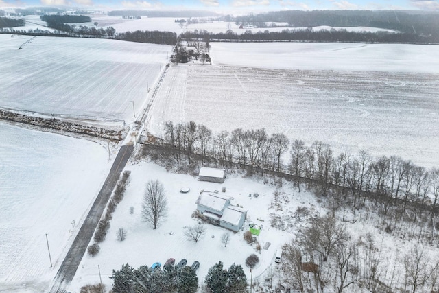 snowy aerial view with a rural view