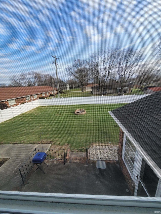 view of yard with an outdoor fire pit