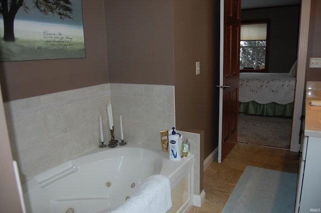 bathroom with vanity and a tub to relax in