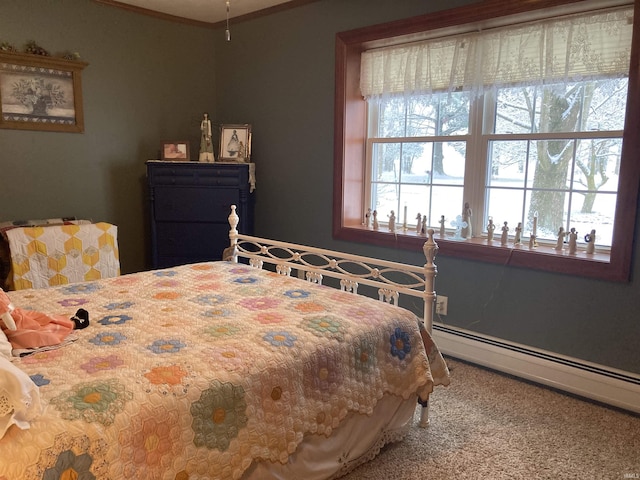 carpeted bedroom with a baseboard heating unit