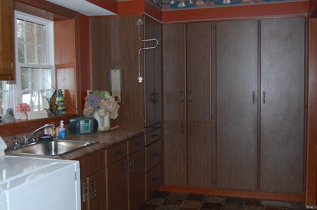 kitchen with stove and sink