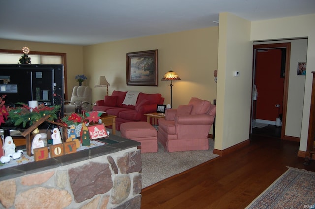 living room with dark wood-type flooring