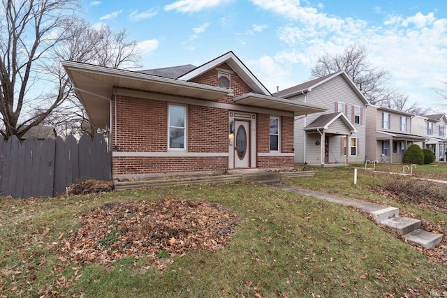 view of front of property featuring a front yard