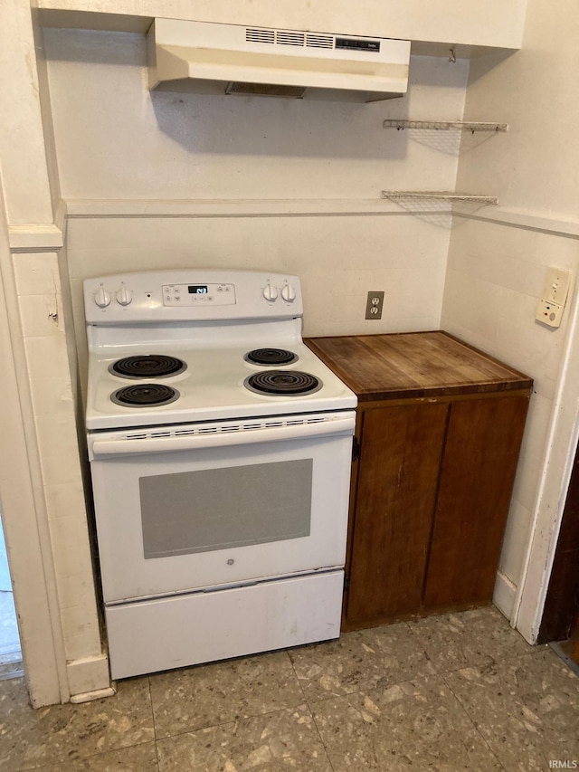 kitchen featuring white electric range oven and extractor fan