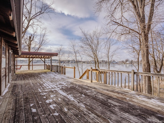 wooden terrace with a water view