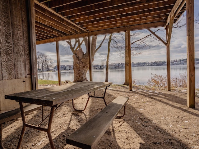 view of patio / terrace with a water view