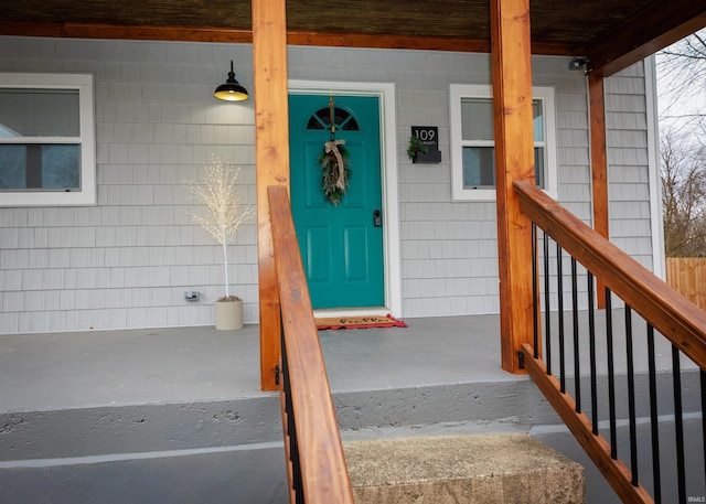 doorway to property with a porch