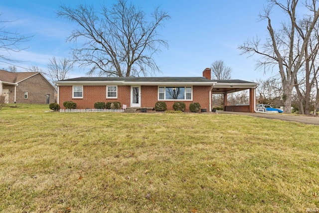 ranch-style home with a carport and a front lawn