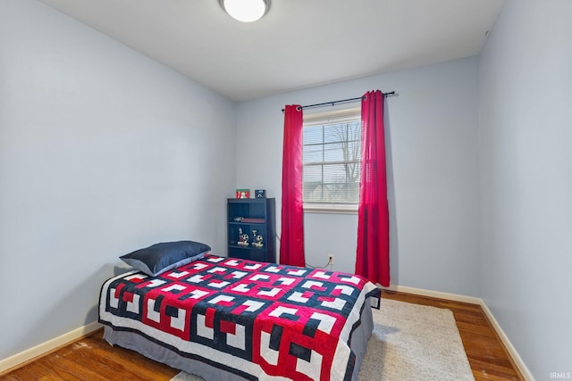 bedroom featuring hardwood / wood-style floors