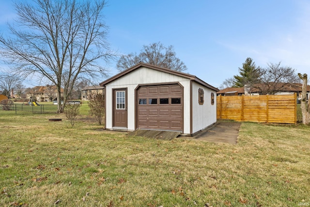 garage featuring a yard