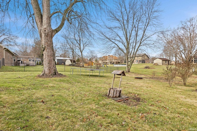 view of yard featuring a trampoline