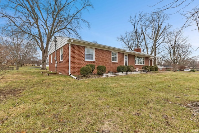 single story home with a front yard