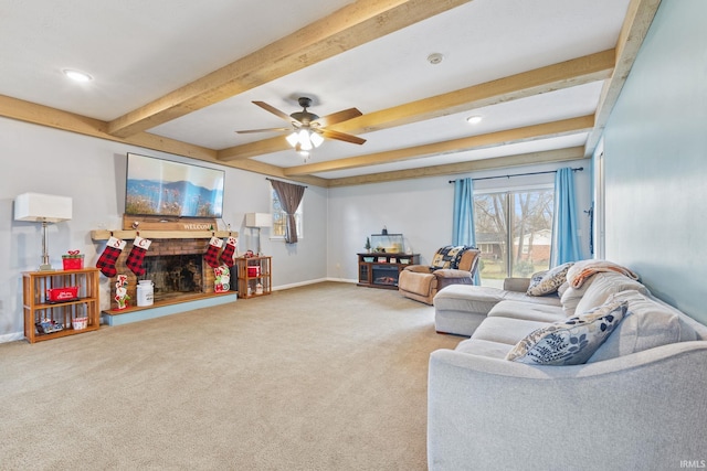 carpeted living room with beam ceiling and ceiling fan