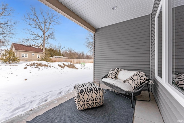 view of snow covered patio