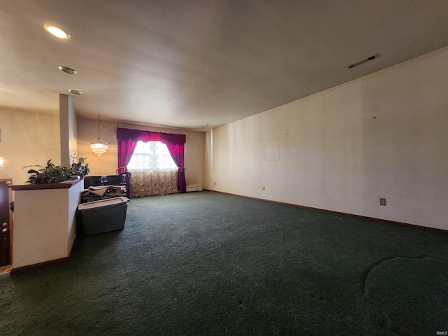 carpeted bedroom with baseboard heating