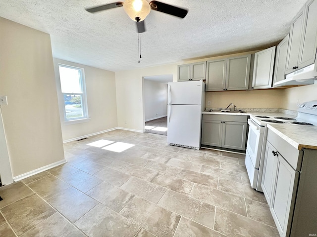 kitchen with gray cabinetry, ceiling fan, sink, ventilation hood, and white appliances